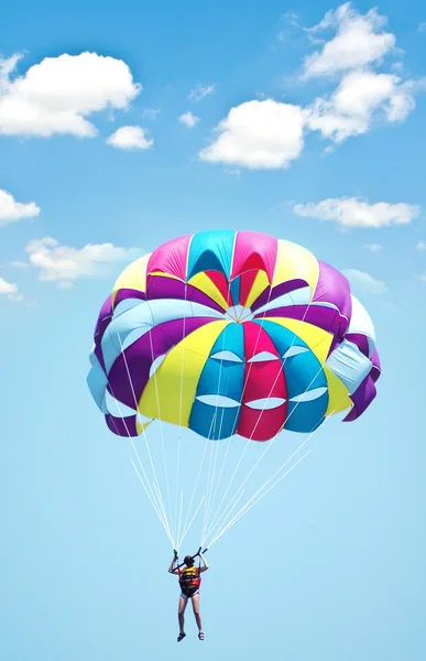 Multi coloured parachute over the sky — Stock Photo, Image