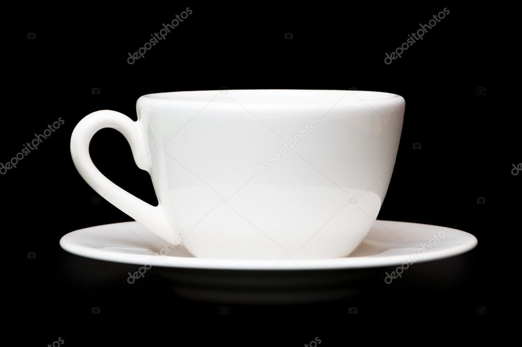 White tea cup isolated on black