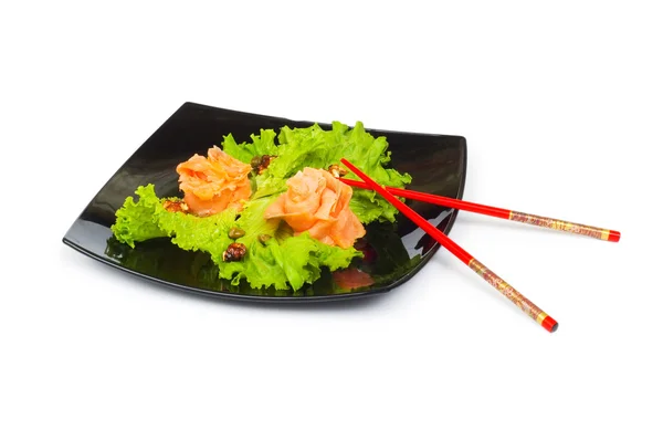 Изолированная тарелка суши из лосося — стоковое фото