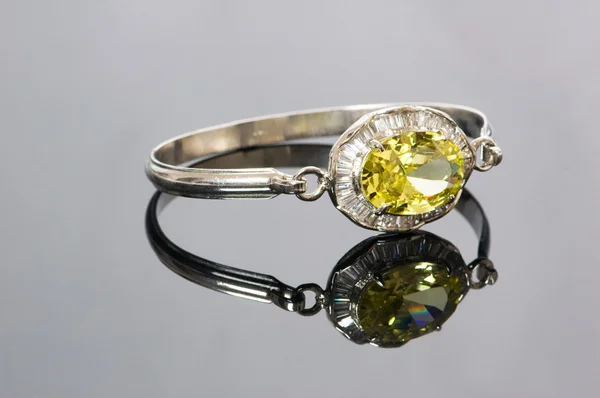 Bracelet with yellow stone — Stock Photo, Image