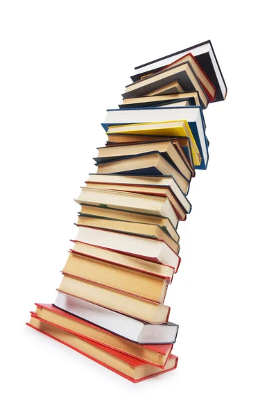 Куча книг, изолированных на белом — стоковое фото