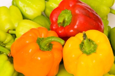Bell peppers arranged at the market clipart