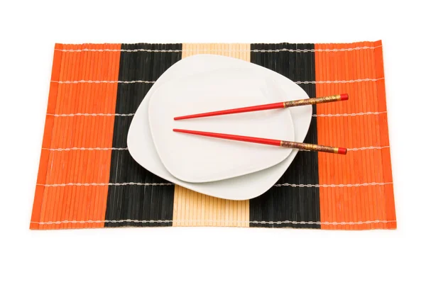 Vit platta med ätpinnar isolerade — Stockfoto