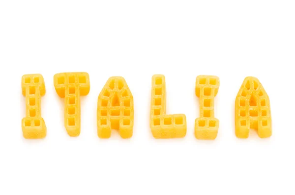 Word Italia written with pasta shapes — Stock Photo, Image