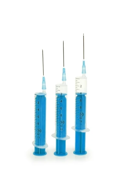 Three syringes isolated on the white — Stock Photo, Image