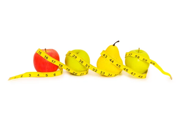 Manzanas y pera que ilustran la dieta — Foto de Stock