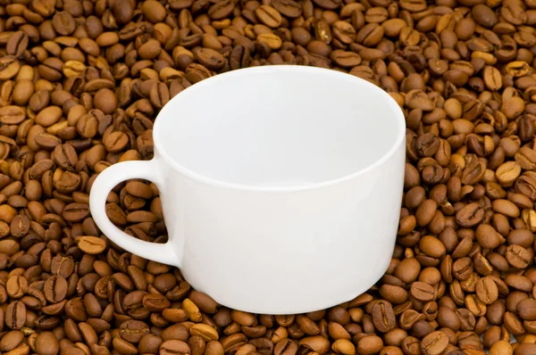 Taça branca no fundo do café — Fotografia de Stock