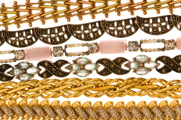 Various bracelets isolated on the white — Stock Photo, Image