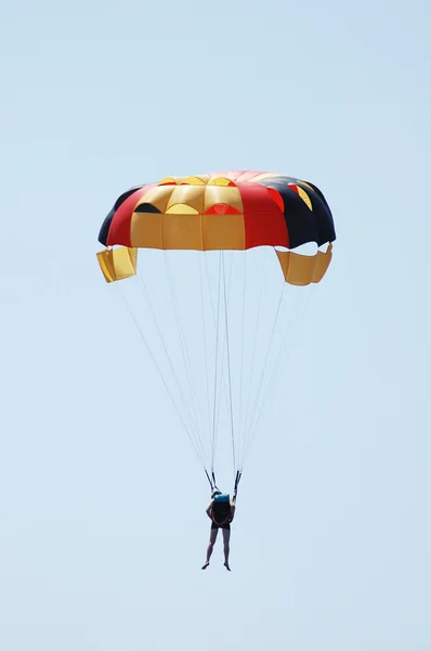 Multi coloured parachute over the sky Royalty Free Stock Photos