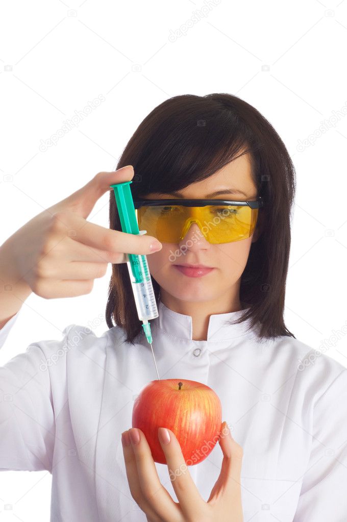 Woman scientist injecting chemicals