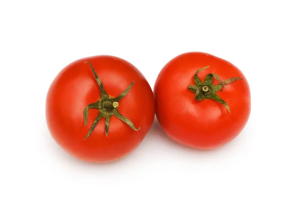 Tomates vermelhos isolados no branco — Fotografia de Stock