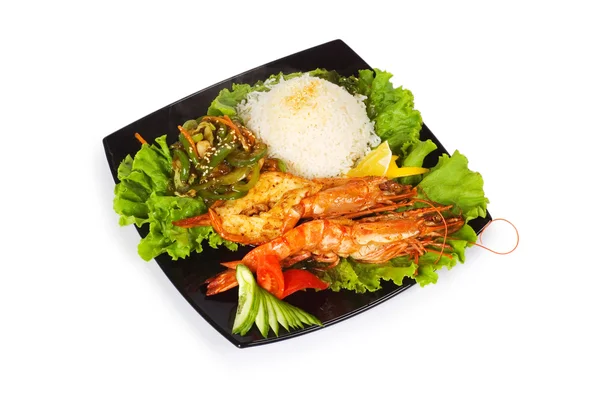 Lagosta grelhada, arroz e legumes — Fotografia de Stock