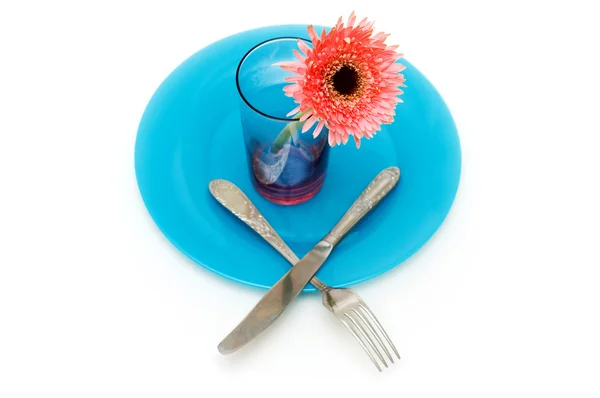 stock image Blue plate and table utensils isolated