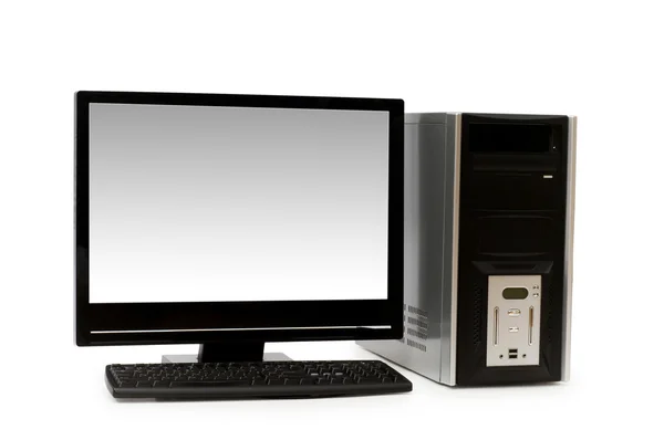 计算机与孤立的纯平屏幕 — 图库照片
