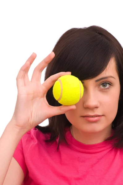 Girl holding tennis ball on white — Stock Photo, Image