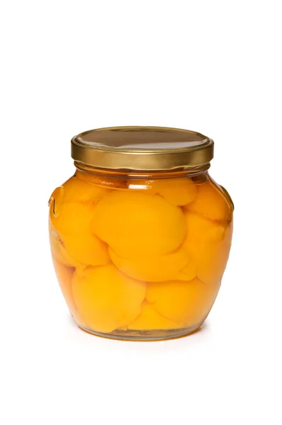 Pot met perziken geïsoleerde — Stockfoto