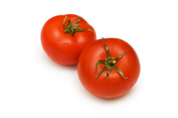 Pomodori rossi isolati sul bianco — Foto Stock