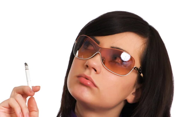 Młoda dziewczyna na białym tle palenia — Zdjęcie stockowe