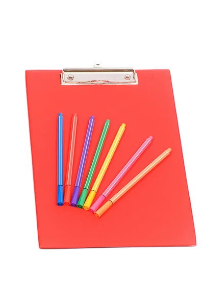 Pad rojo y lápices de colores aislados — Stockfoto
