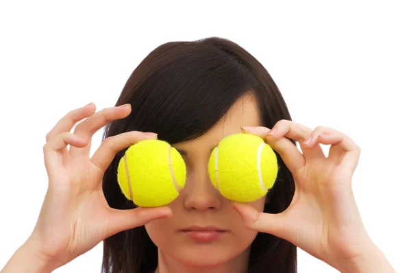 Ragazza in possesso di due palle da tennis — Foto Stock