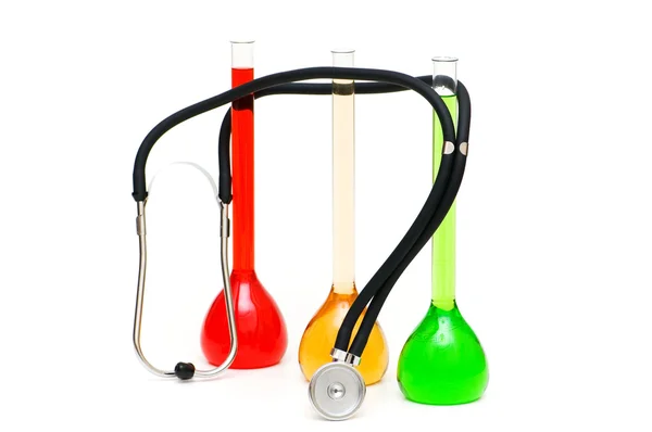 Three tubes and stethoscope isolated — Stock Photo, Image