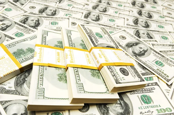 Ten thousand dollar stacks on money — Stock Photo, Image