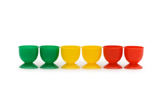 Seis soportes de huevo de colores aislados — Foto de Stock