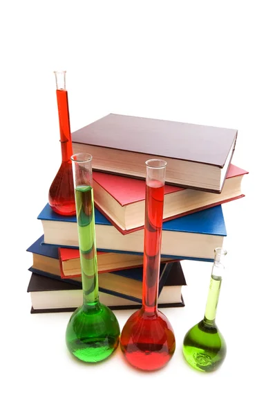 Conceito de química com tubos e livros — Fotografia de Stock