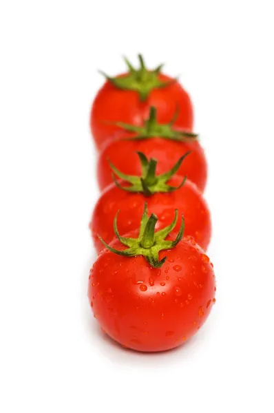 Τέσσερις ντομάτες απομονωμένη στο λευκό — Φωτογραφία Αρχείου
