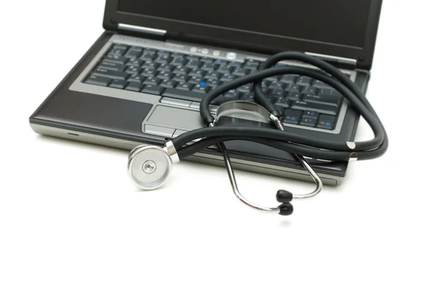 Stethoscope and laptop — Stock Photo, Image