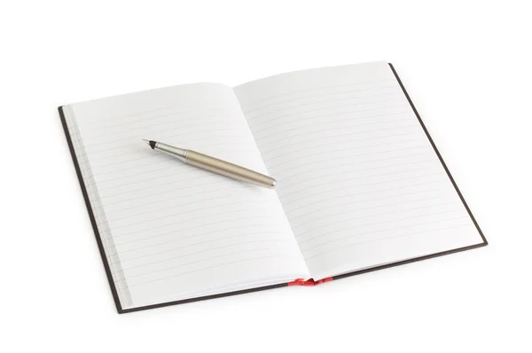 Penna sopra il notebook isolato — Foto Stock
