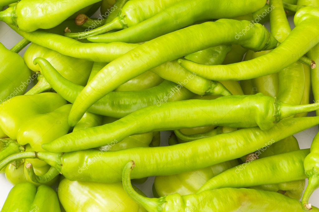 Many green hot peppers arranged — Stock Photo © Elnur_ 2603385