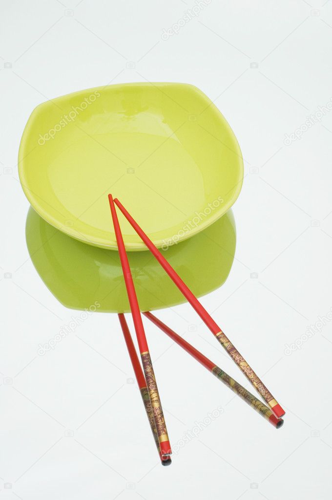 Red plate and chopsticks