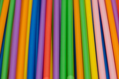 Drinking straws of many bright colors clipart