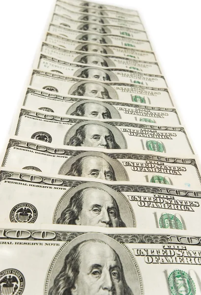 Stos dolarów amerykańskich na białym tle — Zdjęcie stockowe