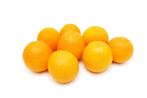 Багато апельсинів ізольовані — стокове фото