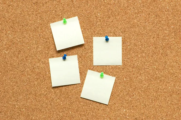 Yellow post it notes on the corkboard — Stock Photo, Image