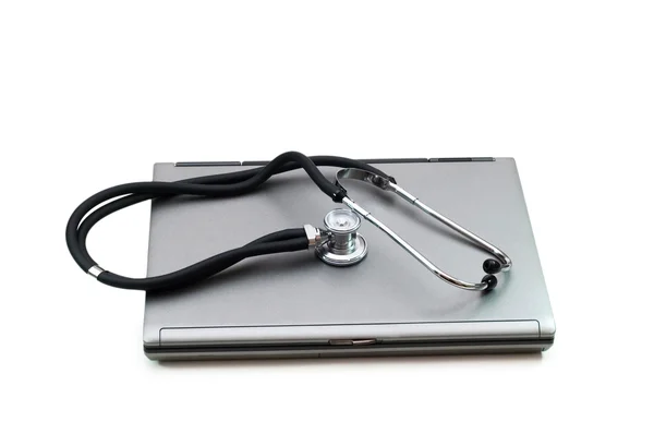 Stethoscope and laptop — Stock Photo, Image