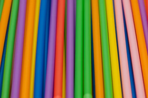 Trinkhalme in vielen bunten Farben — Stockfoto