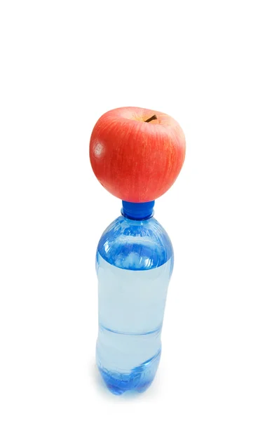 Health concept with bottle and apple — Stock Photo, Image