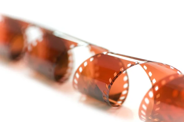 Roll of film isolated on the white - — Stock Photo, Image