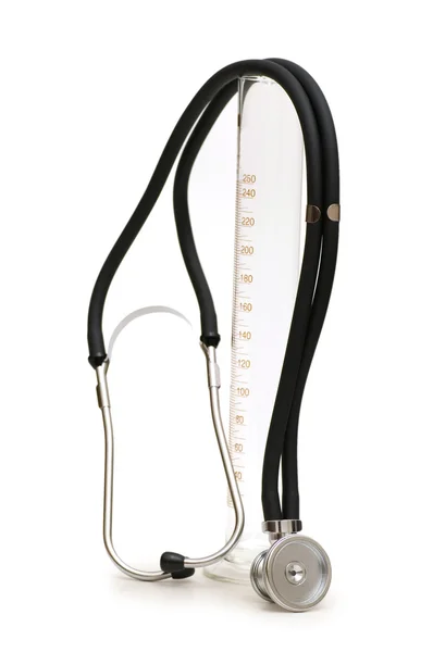 Stetoskop i pomiarowe szkło — Zdjęcie stockowe