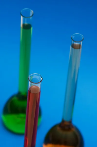 Vários tubos isolados no azul — Fotografia de Stock