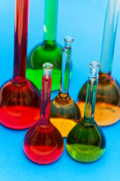 Various tubes isolated on the blue — Stock Photo, Image