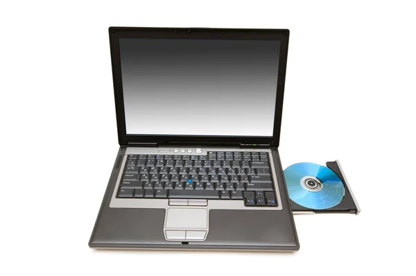 Laptop a izolované jednotky cd — Stock fotografie