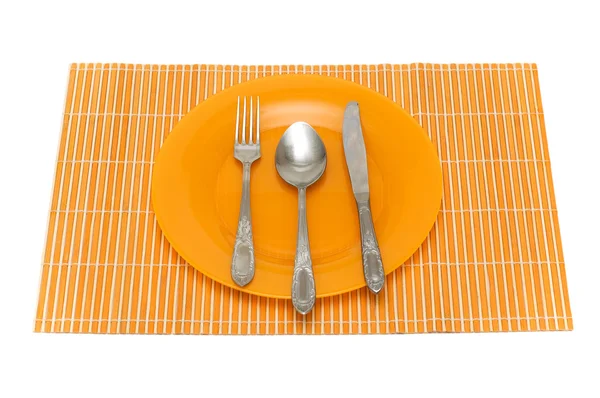 Conjunto de utensílios de mesa na placa — Fotografia de Stock