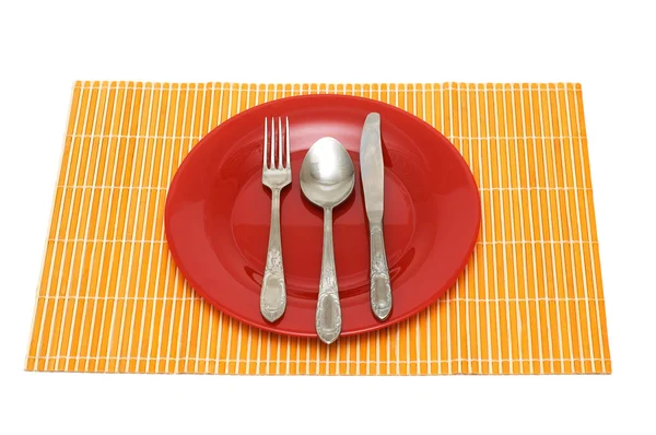 Conjunto de utensílios de mesa na placa — Fotografia de Stock