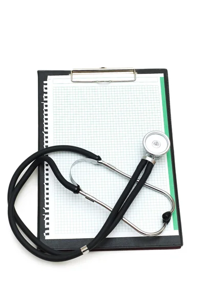 Stethoscope on the binder isolated — Stock Photo, Image