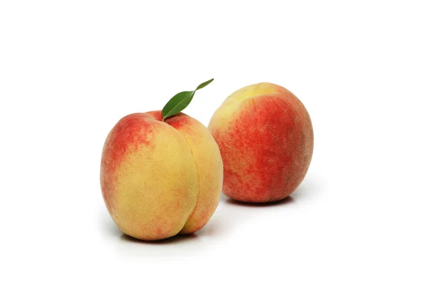 Two peaches isolated on the white — Stock Photo, Image