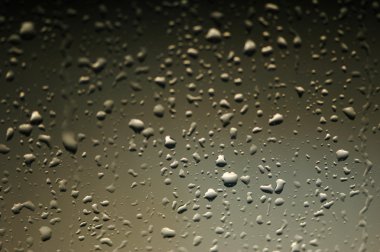 Metal surface covered with water drops clipart